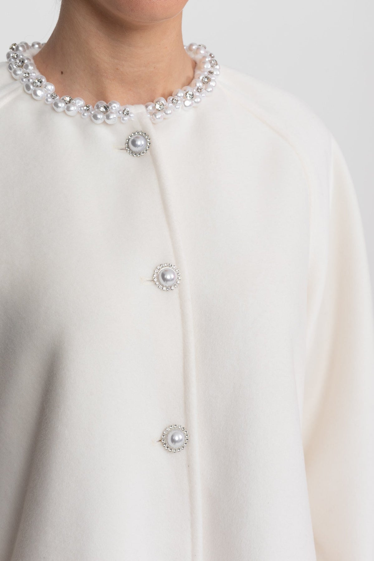 Longline Coat With Pearl Embellished Neckline And Fur Cuffs - White